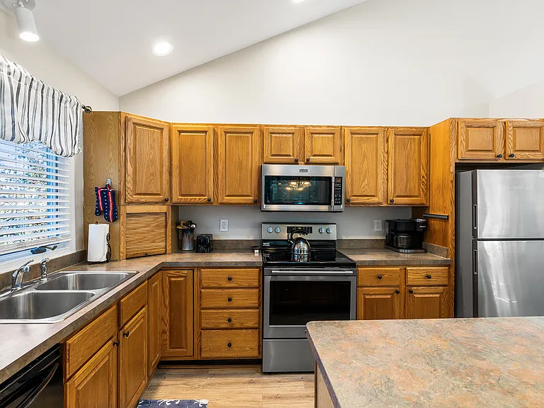 Fully-equipped kitchen with ample counter space, modern appliances, and everything needed for everyday cooking, baking, and extended stays