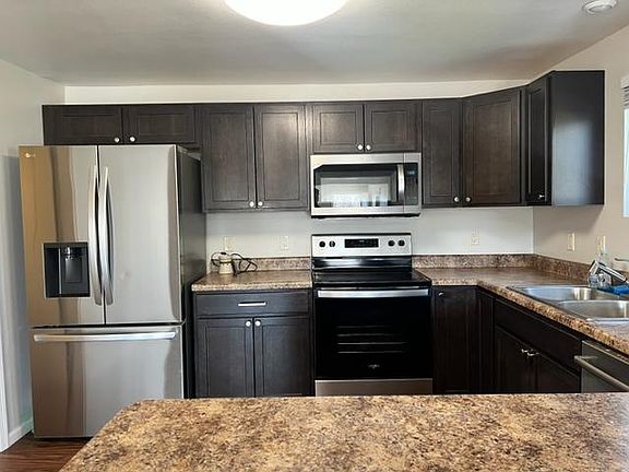 Beautiful espresso cabinetry throughout