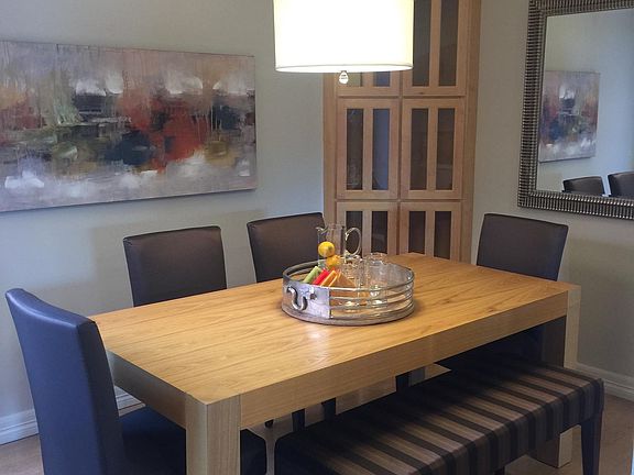 Dining rm adjacent to kitchen w/2 built in cabinets