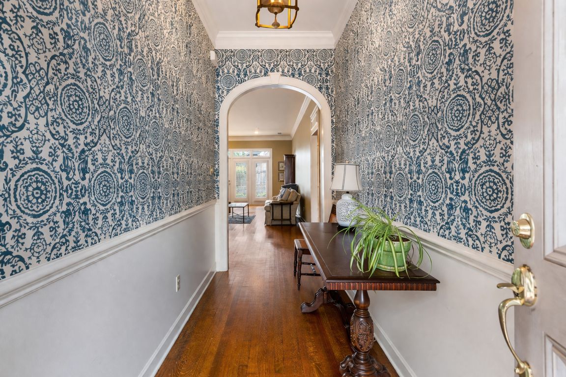 Elegant foyer with hardwood floors
