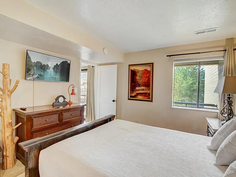 Primary bedroom with queen bed
