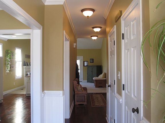 Sight lines right through to the family room offer guests an inviting entry.