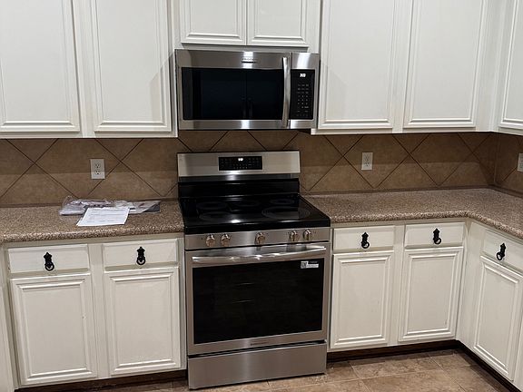 Newly Installed Stainless Convection Range and Microwave