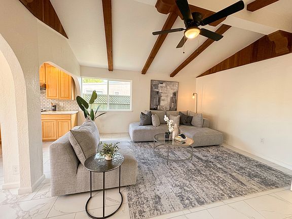 Sample furnishing of the spacious living area with exposed beam design