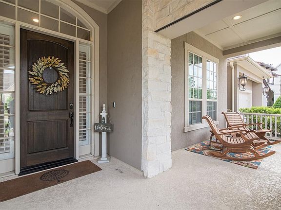How inviting the front entry is! It has an extended covered porch facing North to help protect you from the rain and the sun.