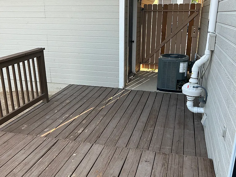 patio to the front of the house and garage