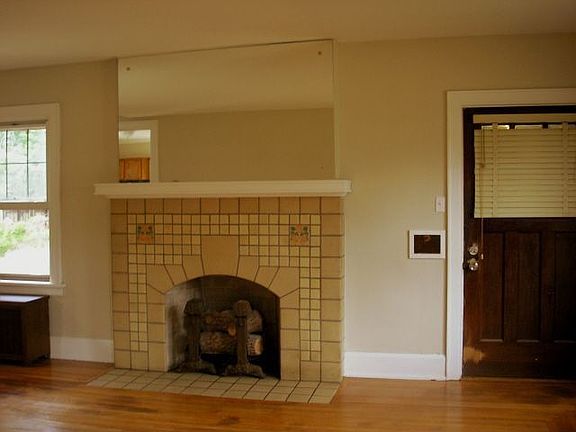 Formal Living Room with Ceramic Tile Fireplace