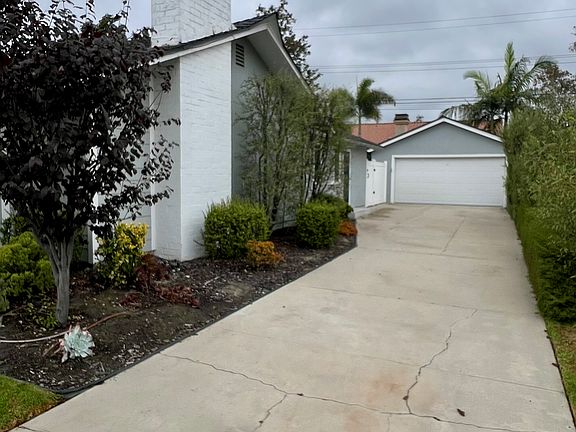 Long driveway for extra parking and full 2 car garage