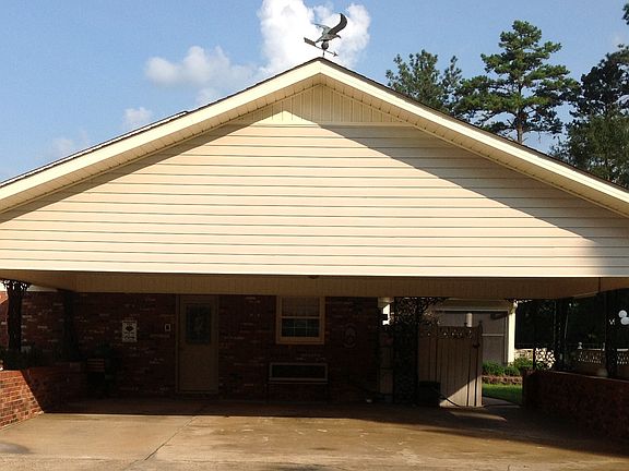 Large 3 vehicle carport.