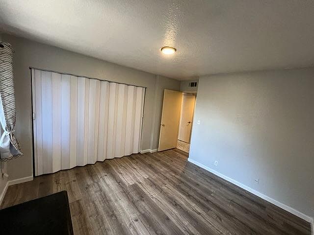Bedroom with window and closet