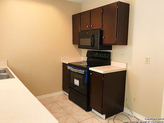3rd image of 9226 Village Brown