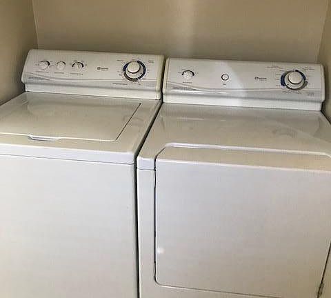 Washer dryer in laundry room