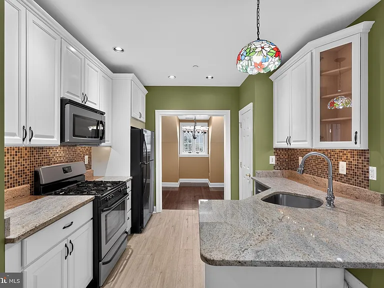 7220 Ridge Ave #G — Photo 8