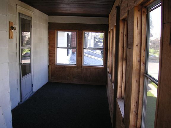 ENCLOSED FRONT PORCH