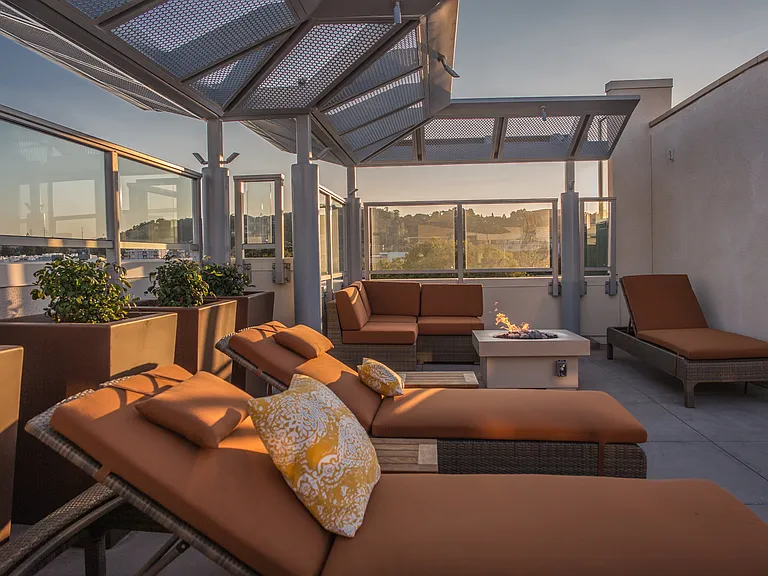 Sit back and relax on our rooftop deck with lounge seating and a fireplace