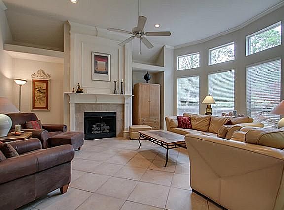 Beautiful Fireplace Accents Spacious Family Room 