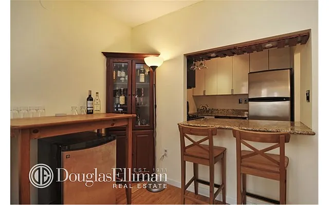 Sold by Douglas Elliman | media 13