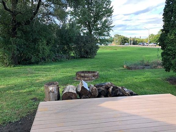 Looking out backdoor over deck towards corner of Hwy 63 and Ansborough.
