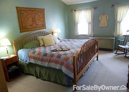 Master bedroom with cathedral ceiling
