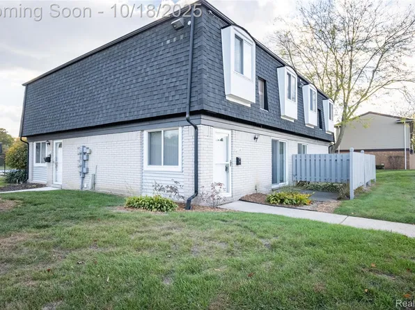 41134 N Woodbury Green Dr, Belleville, MI 48111