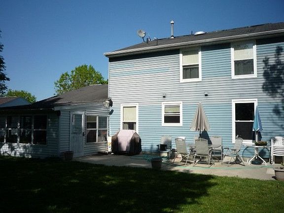 Rear of home w/ patio 