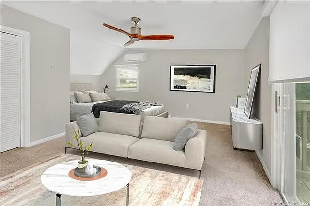 upstairs bedroom with balcony