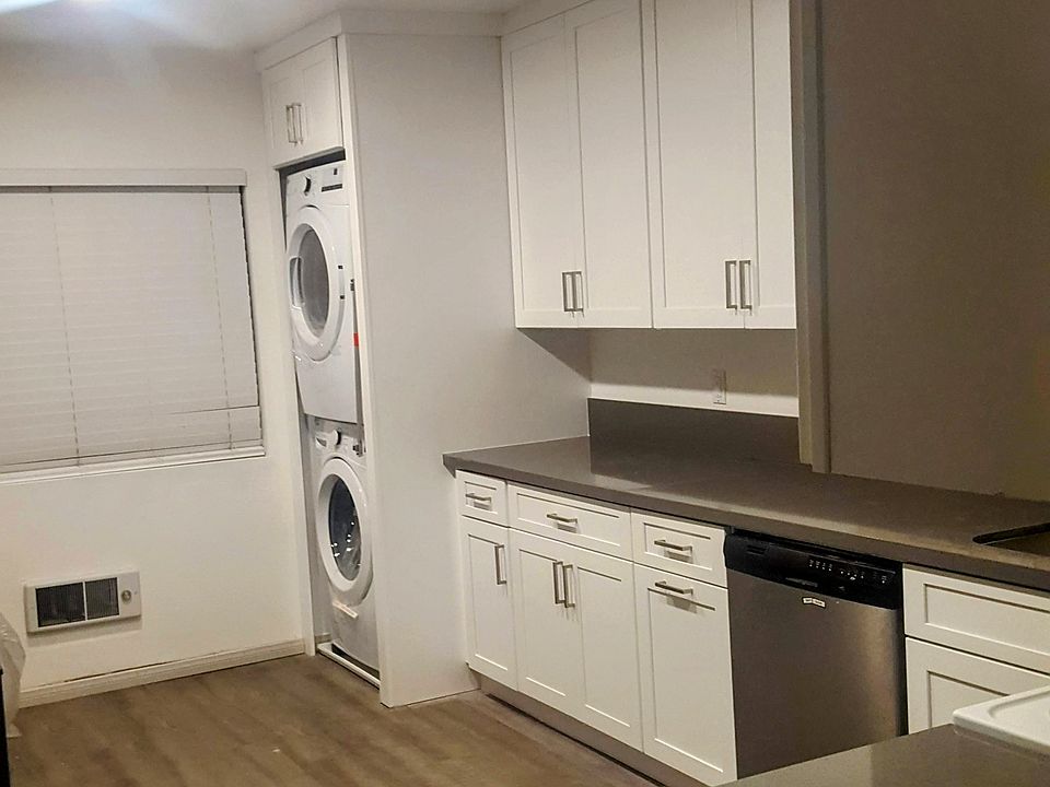 Kitchen with washer and dryer