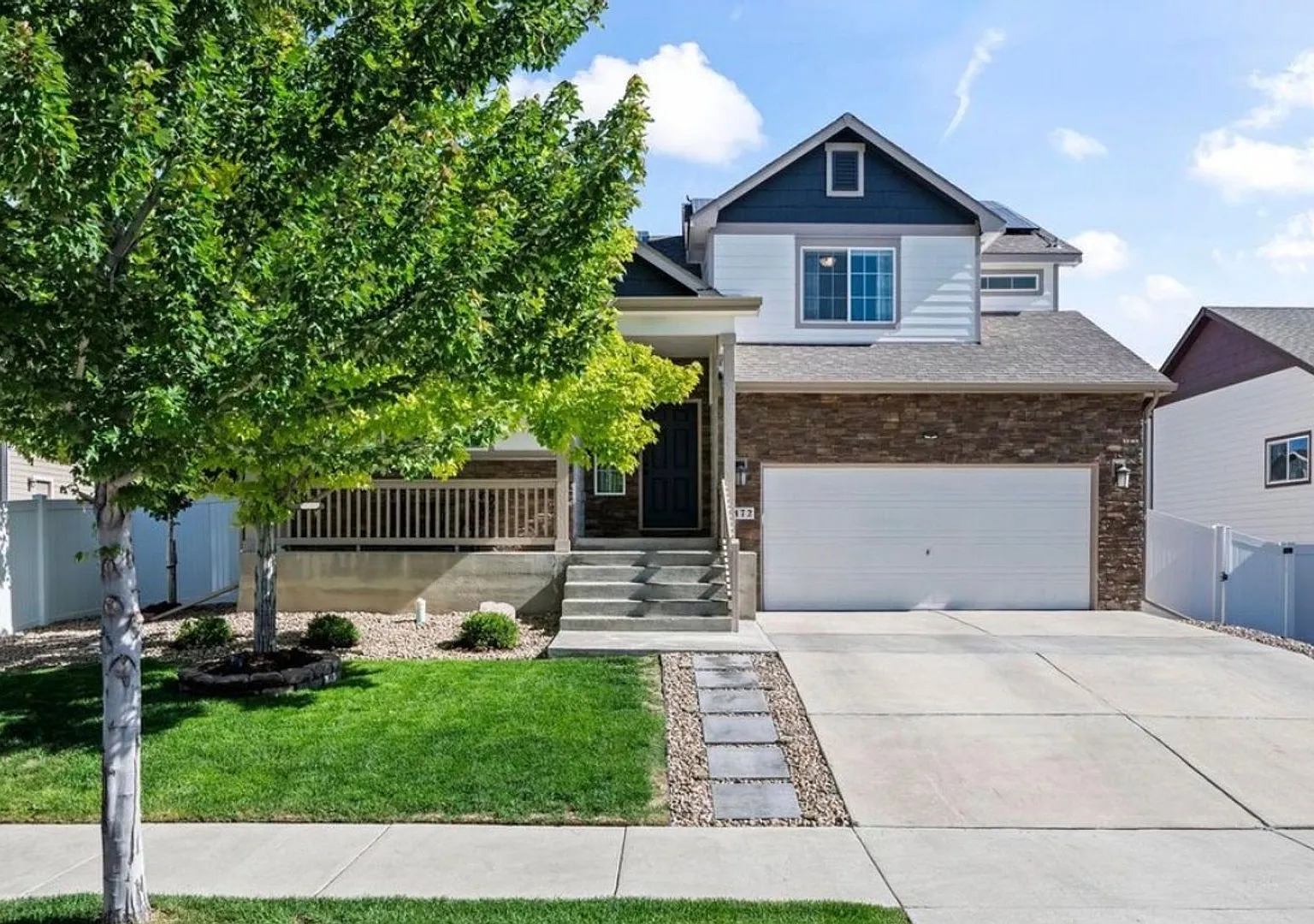 Beautiful, light-filled home for rent in sought-after Heron Pointe in Berthoud, CO — Photo 1