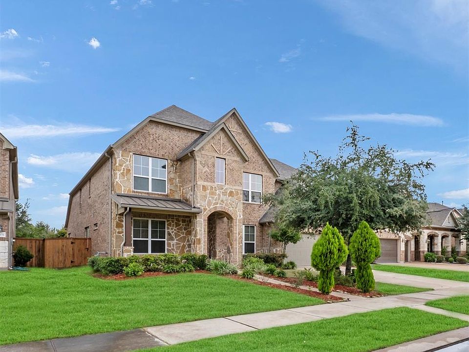 Gorgeous 5/4/2 home located on a quiet street with no back neighbors in the beautiful neighborhood of Aliana. This home has wonderful curb appeal with its handsome, brick and stone elevation and is completely move in ready with nice, neutral paint an