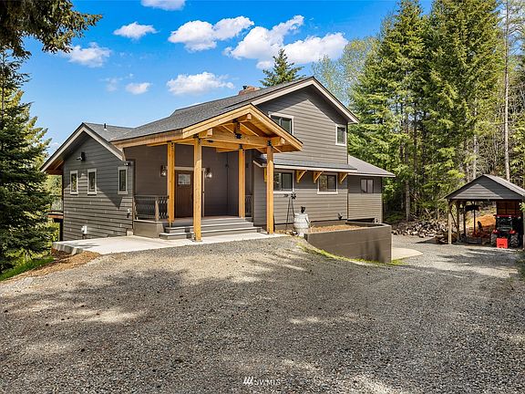 Plenty of parking and a newly built covered entry.>