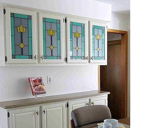 Cabinet detail. Note Corian countertops
