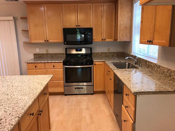 Note: there is a new microwave over the range and a refrigerator in the space on the right.