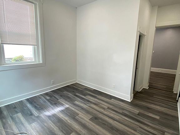 Bedroom -Luxury vinyl plank flooring, led lighting. large closet ceiling fan