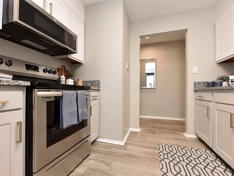 Kitchen with granite counters and stainless appliances