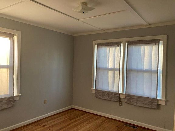 Front bedroom. Refinished hardwoods.
