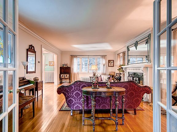 Living room leads to sunroom