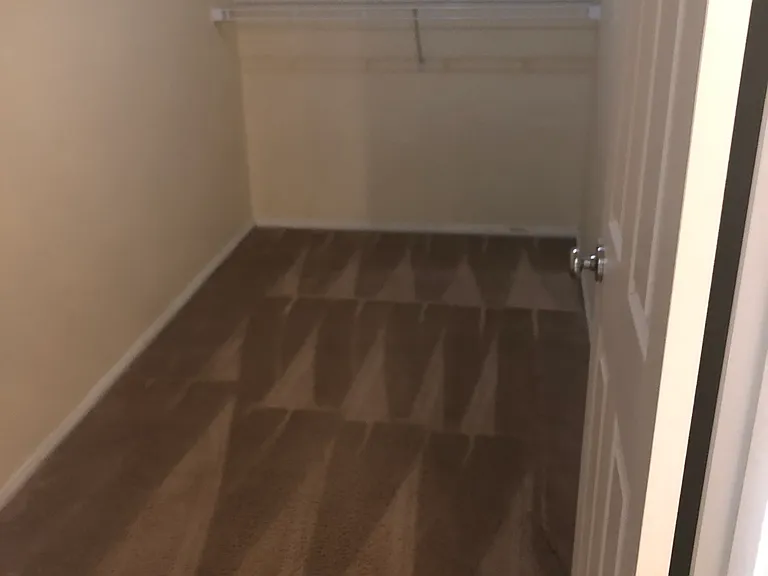 Walk in closet in master bedroom