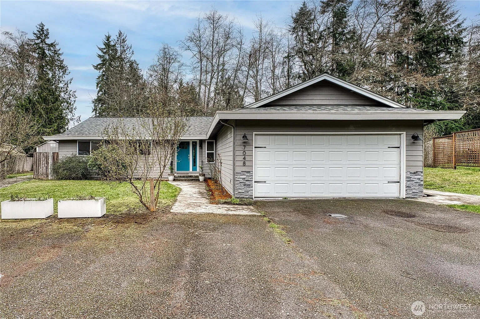 7048 NE Treemont Court photo 1