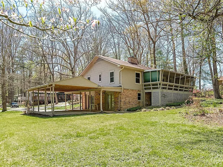Large, flat yard for relaxing, reading, sunbathing. Includes two lawn chairs and table. 
Large covered patio with 4-place bar-height table and chairs.