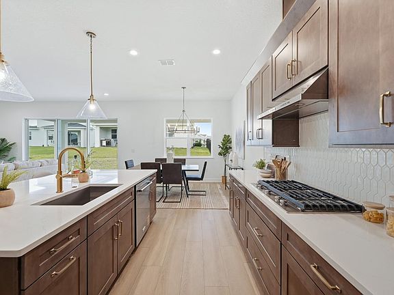 Gather round, entertain, and relax in a grand, light-filled space designed for connection