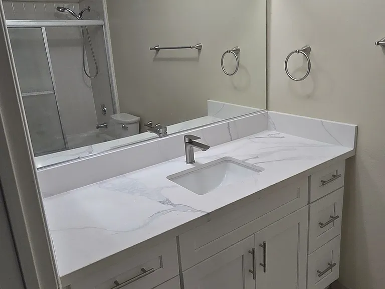 2nd bathroom has been completely updated with new vanity, new Quartz countertop, new sink, new 1-handle faucet, new medicine cabinet, and new towel hangers