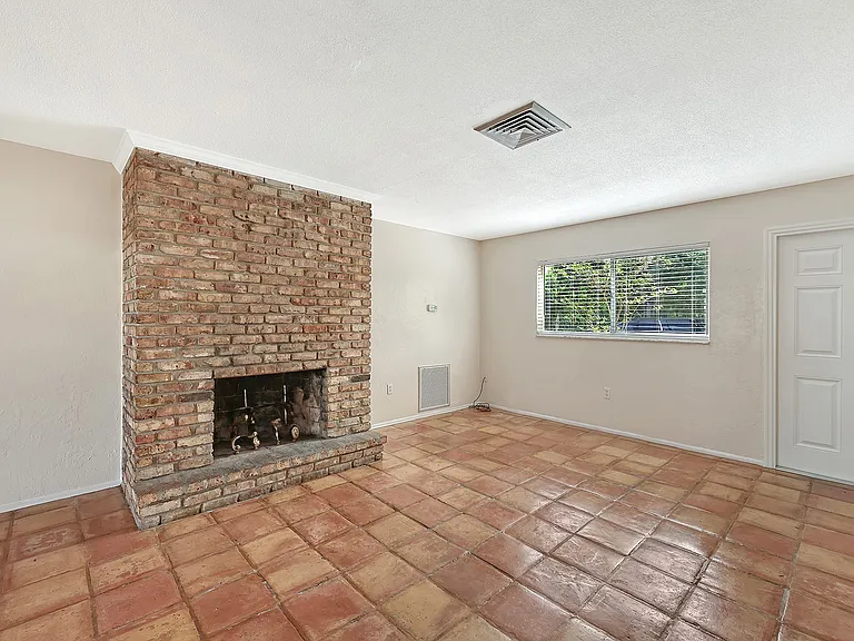 Living room and dining area - fireplace is not useable