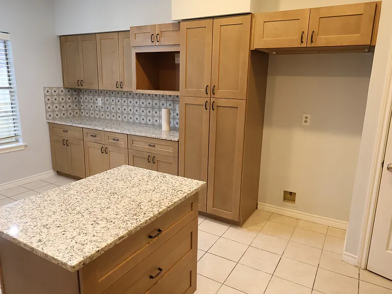Space for your refrigerator. More cabinet space and countertop.