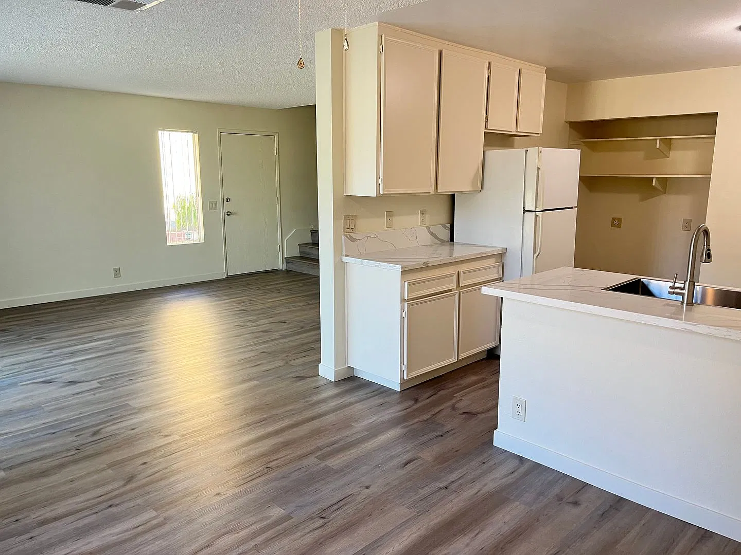 Large two-story townhouse with 3 bedrooms and 2 full baths and a private patio — Photo 1