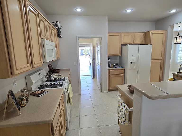 Kitchen, laundry area to garage.