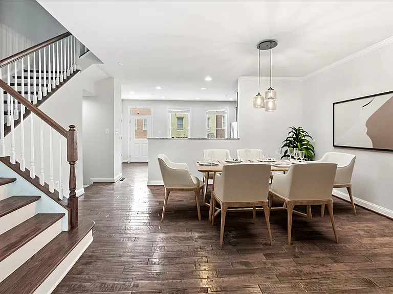 Dining Room that opens to Family Room & Kitchen (Virtual Staging)