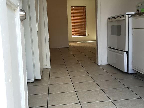 Kitchen connected to dining
