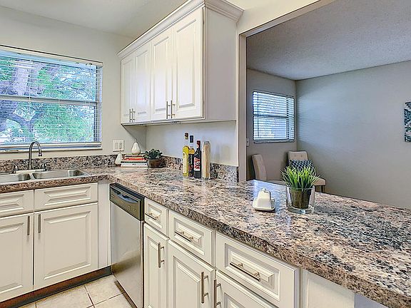 Kitchens are fully applianced including a dishwasher and breakfast bar!