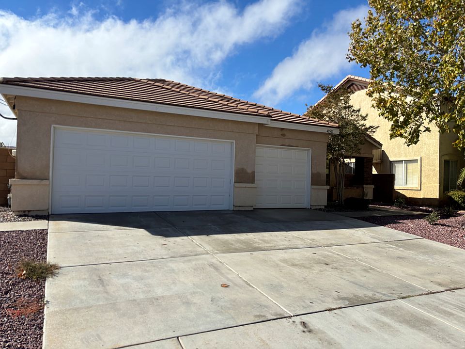 3-Car Garage parking and driveway space for 3 other cars.