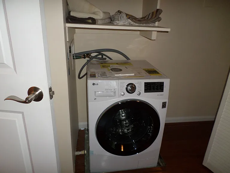 Washer-Dryer Combo in Bedroom